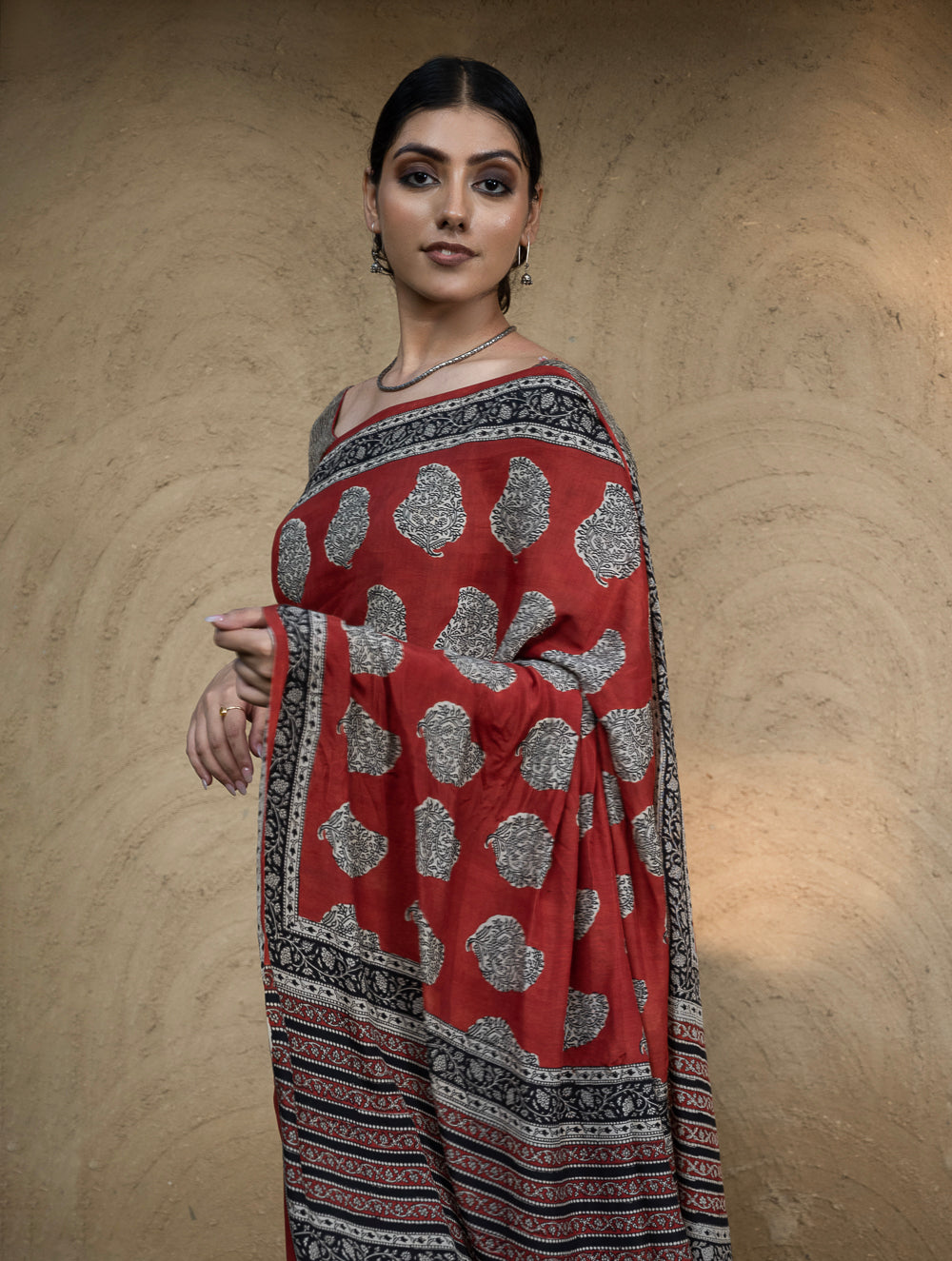 Classic Appeal. Bagru Hand Block Printed Modal Silk Saree - Red Paisleys