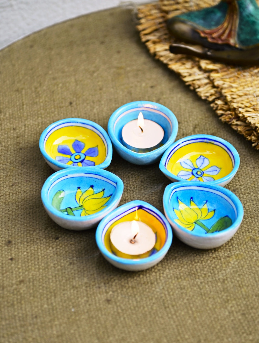 The Heritage Diya Collection: Jaipur Blue Pottery Diyas (Set of 8) & Aromatic Puducherry Candles (Set of 2) - Lemon Blues.