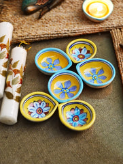 The Heritage Diya Collection: Jaipur Blue Pottery Diyas (Set of 6) & Aromatic Puducherry Candles (Set of 2) - Floral Medley.