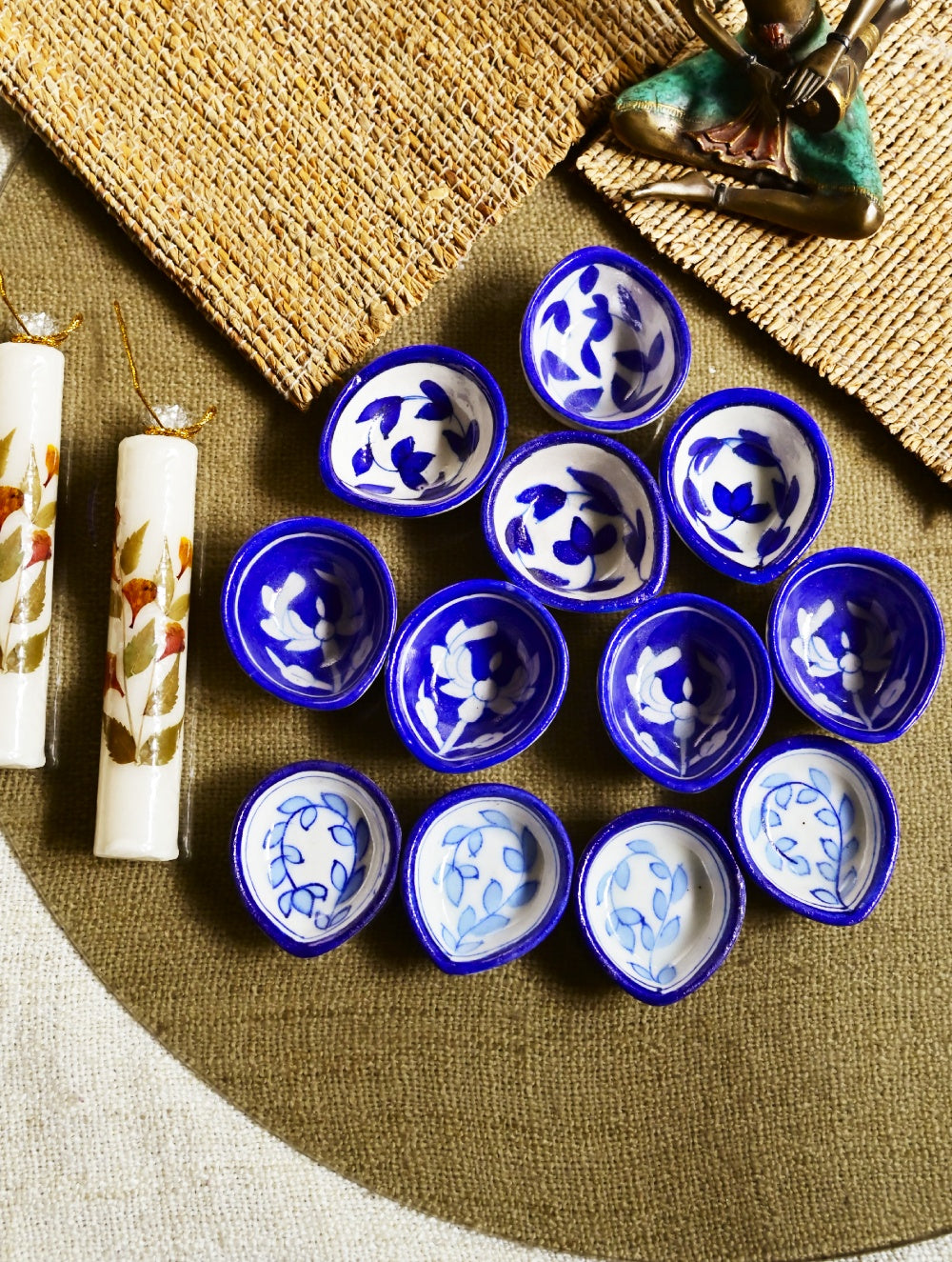 The Heritage Diya Collection: Jaipur Blue Pottery Diyas (Set of 12) & Aromatic Puducherry Candles (Set of 2) - Indigo & White