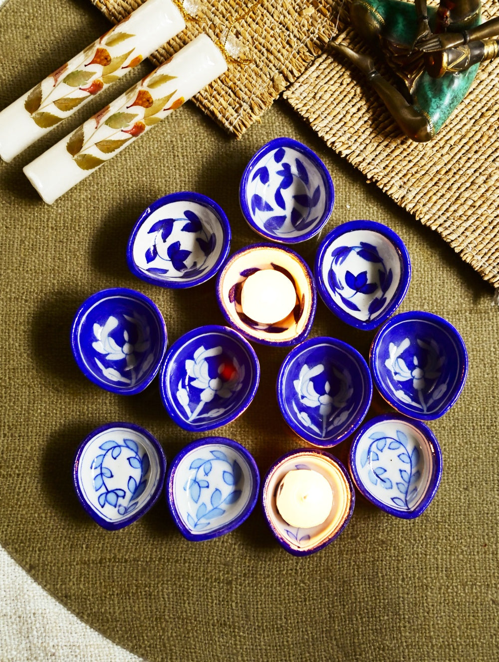 The Heritage Diya Collection: Jaipur Blue Pottery Diyas (Set of 12) & Aromatic Puducherry Candles (Set of 2) - Indigo & White