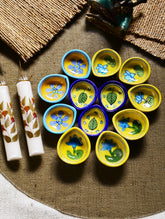 The Heritage Diya Collection: Jaipur Blue Pottery Diyas (Set of 12) & Aromatic Puducherry Candles (Set of 2) - Festive Flora