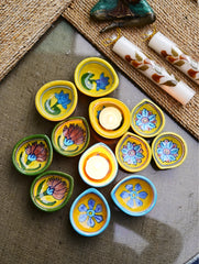 The Heritage Diya Collection: Jaipur Blue Pottery Diyas (Set of 12) & Aromatic Puducherry Candles (Set of 2) - Mustard Flora
