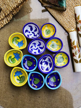 The Heritage Diya Collection: Jaipur Blue Pottery Diyas (Set of 12) & Aromatic Puducherry Candles (Set of 2) - Azure Botanica