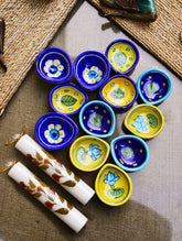 The Heritage Diya Collection: Jaipur Blue Pottery Diyas (Set of 12) & Aromatic Puducherry Candles (Set of 2) - Blue Mustard