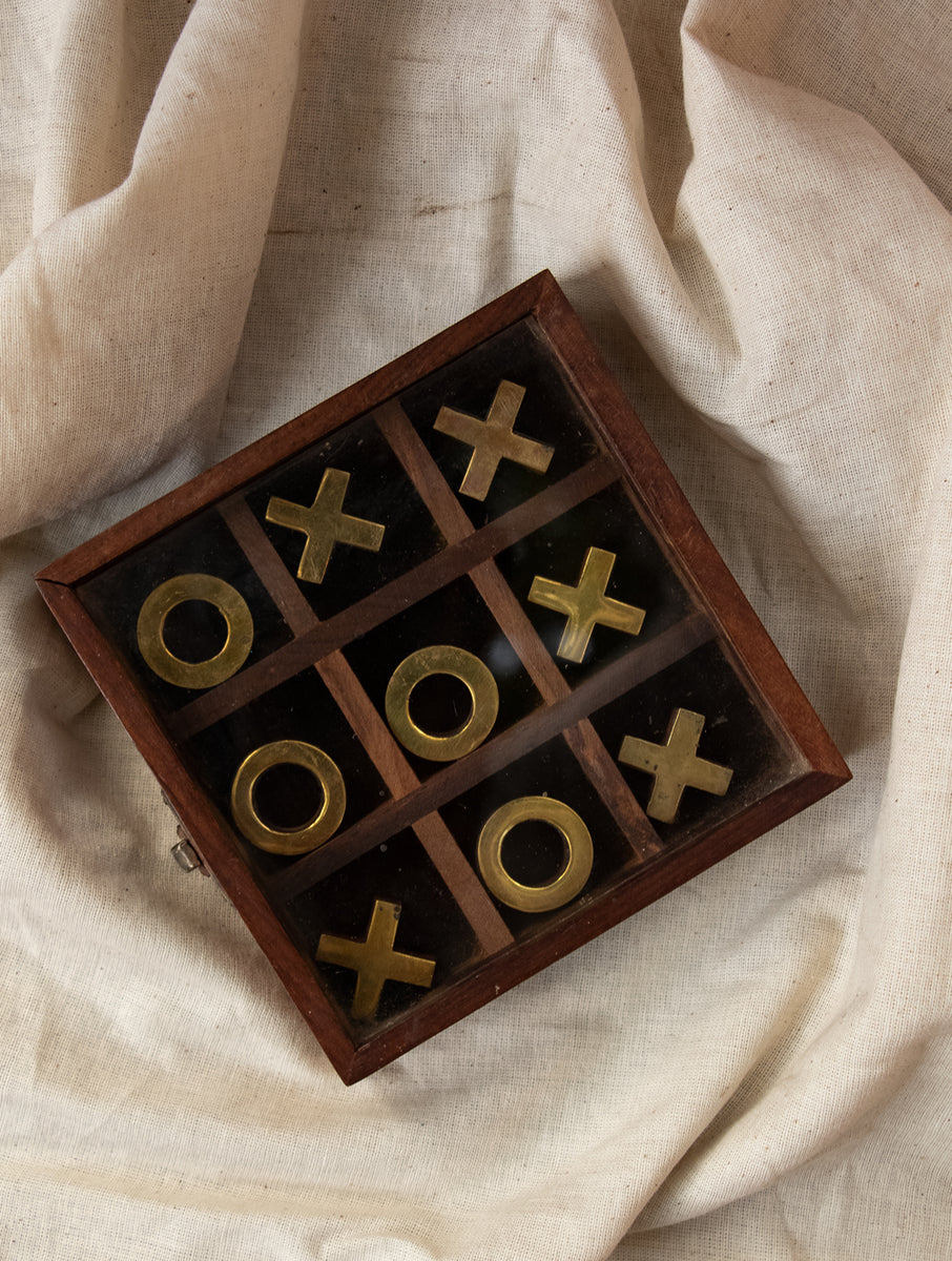 Strategy Tic-Tac-Toe Game With Brass Ornaments In A Wooden Box