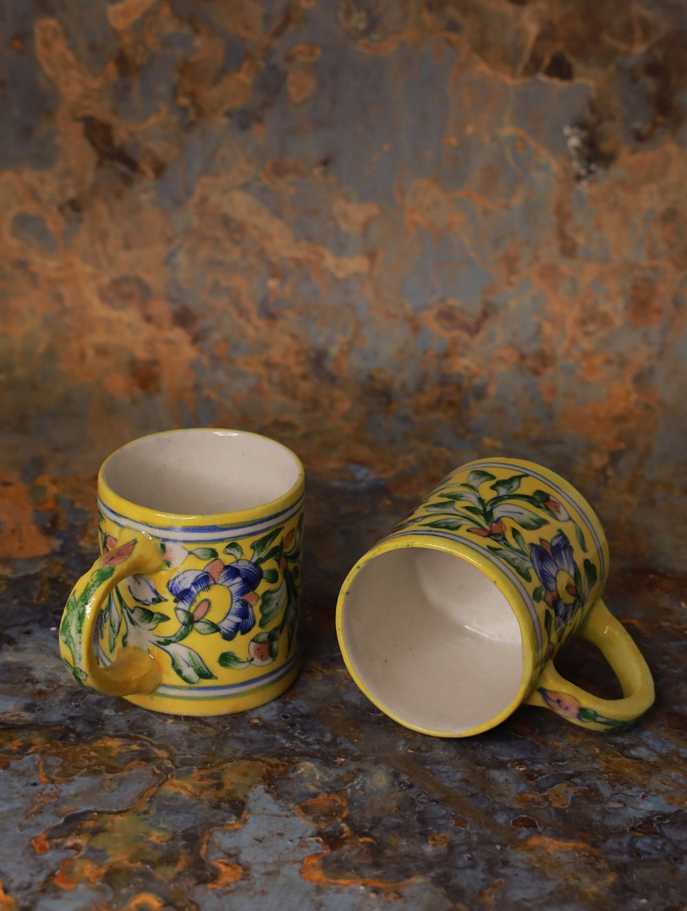 Load image into Gallery viewer, Jaipur Ceramic Blue Pottery Mugs (Set of 2) - Yellow Floral