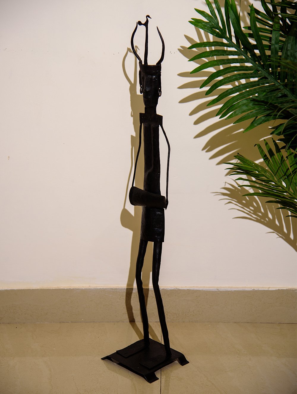 The India Craft House Bastar Tribal Curio Musical Man Figurine - Large