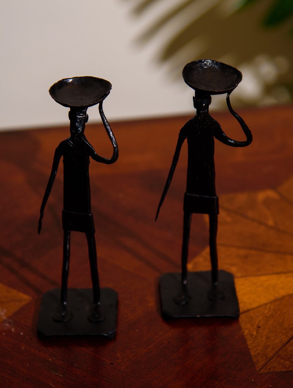 The India Craft House Bastar Tribal Man Candle Holder (Set of 2)