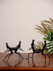 The India Craft House Bastar Tribal Men Couple Candle Holders (Set of 2)