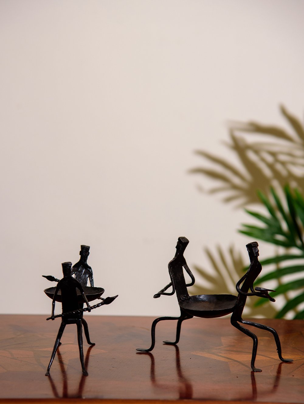 The India Craft House Bastar Tribal Men Couple Candle Holders (Set of 2)