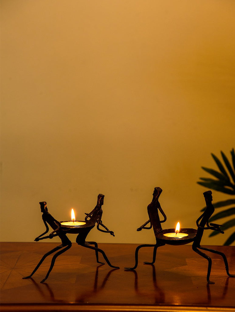 The India Craft House Bastar Tribal Men Couple Candle Holders (Set of 2)