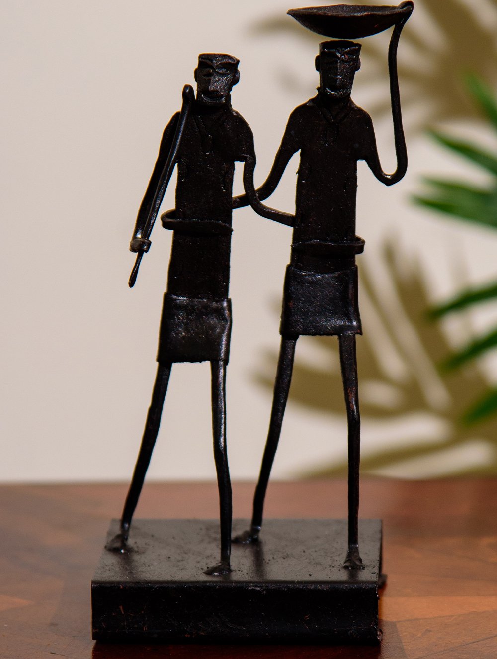 The India Craft House Bastar Tribal Two Men Candle Holder