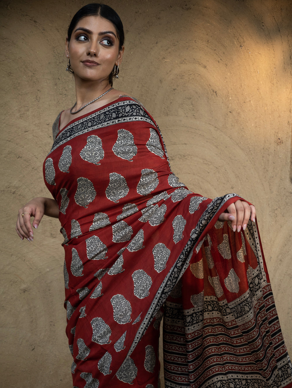 Classic Appeal. Bagru Hand Block Printed Modal Silk Saree - Red Paisleys