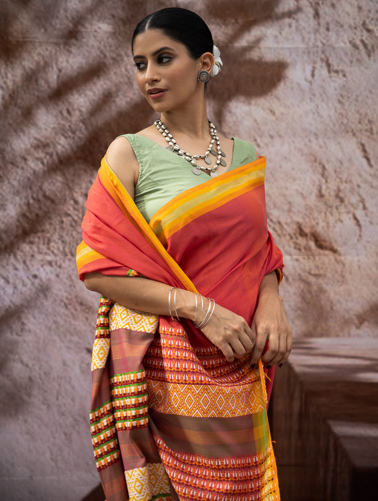 Striking Elegance. Exclusive Handwoven North-East Cotton Saree - Coral Reverie