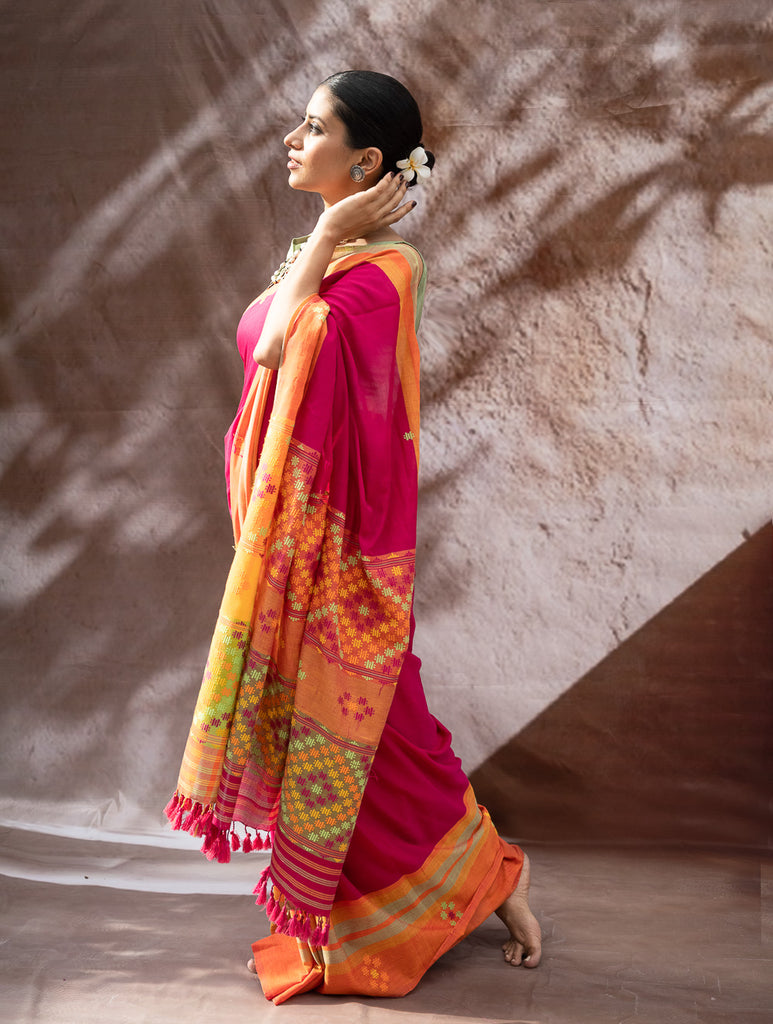 Striking Elegance. Exclusive Handwoven North-East Cotton Saree - Fuchsia Tapestry
