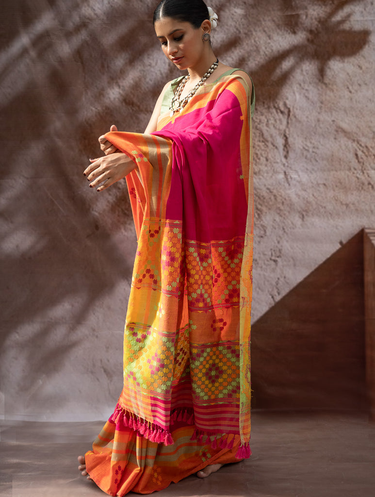 Striking Elegance. Exclusive Handwoven North-East Cotton Saree - Fuchsia Tapestry