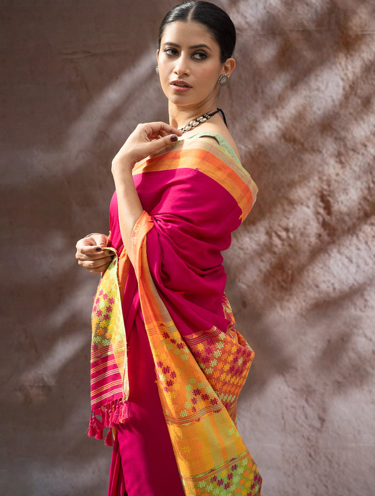 Striking Elegance. Exclusive Handwoven North-East Cotton Saree - Fuchsia Tapestry