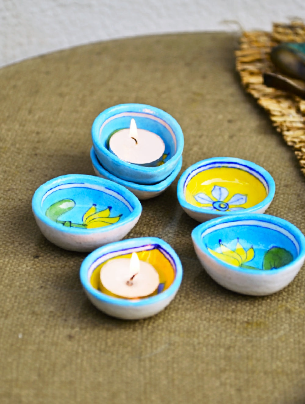 The Heritage Diya Collection: Jaipur Blue Pottery Diyas (Set of 8) & Aromatic Puducherry Candles (Set of 2) - Lemon Blues.