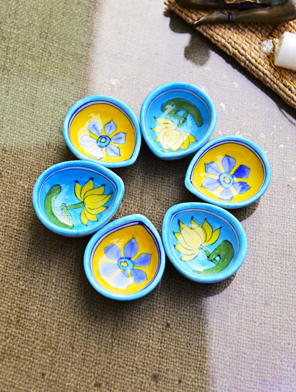 The Heritage Diya Collection: Jaipur Blue Pottery Diyas (Set of 8) & Aromatic Puducherry Candles (Set of 2) - Lemon Blues.