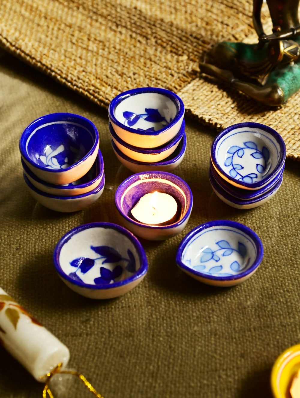 The Heritage Diya Collection: Jaipur Blue Pottery Diyas (Set of 12) & Aromatic Puducherry Candles (Set of 2) - Indigo & White
