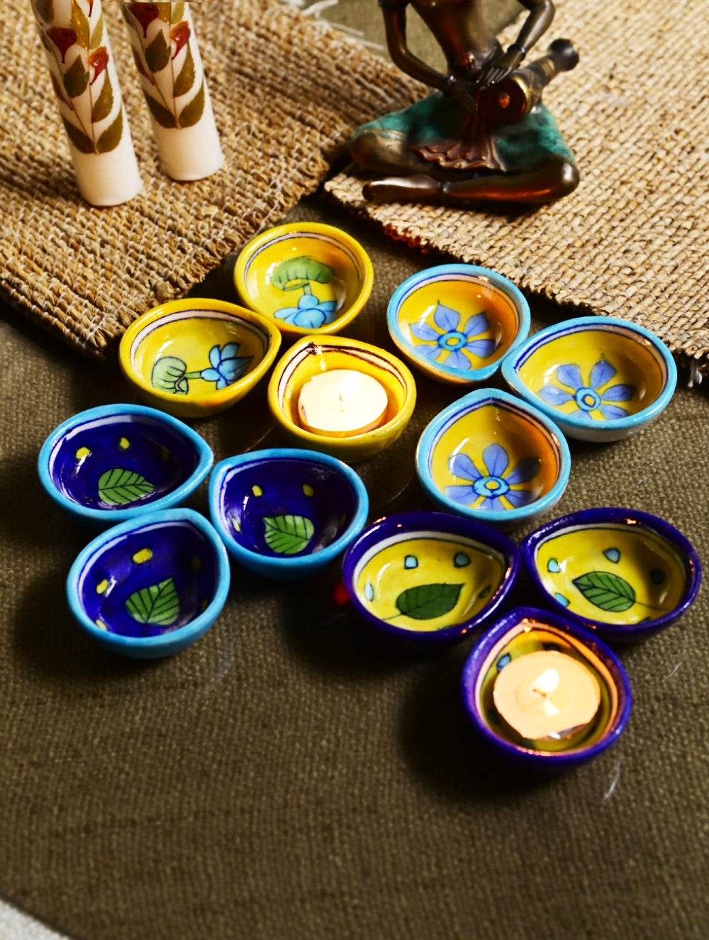 The Heritage Diya Collection: Jaipur Blue Pottery Diyas (Set of 12) & Aromatic Puducherry Candles (Set of 2) - Botanical Radiance