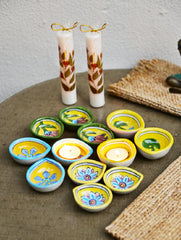 The Heritage Diya Collection: Jaipur Blue Pottery Diyas (Set of 12) & Aromatic Puducherry Candles (Set of 2) - Mustard Flora