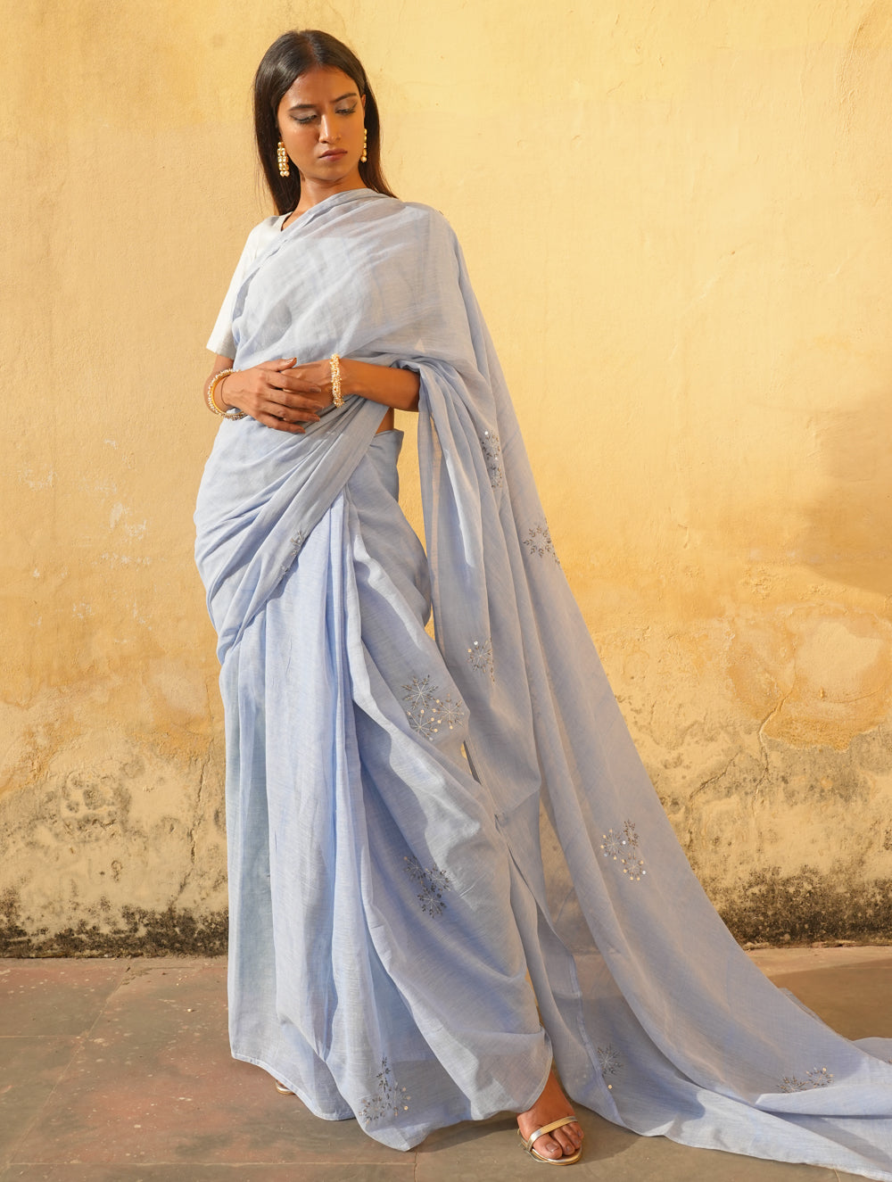 Sky blue semi tussar saree with blue and gold border | Designer saree blouse  patterns, Silk saree blouse designs, Saree dress
