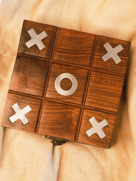 Strategy Tic-Tac-Toe Game With Brass Ornaments In A Wooden Box