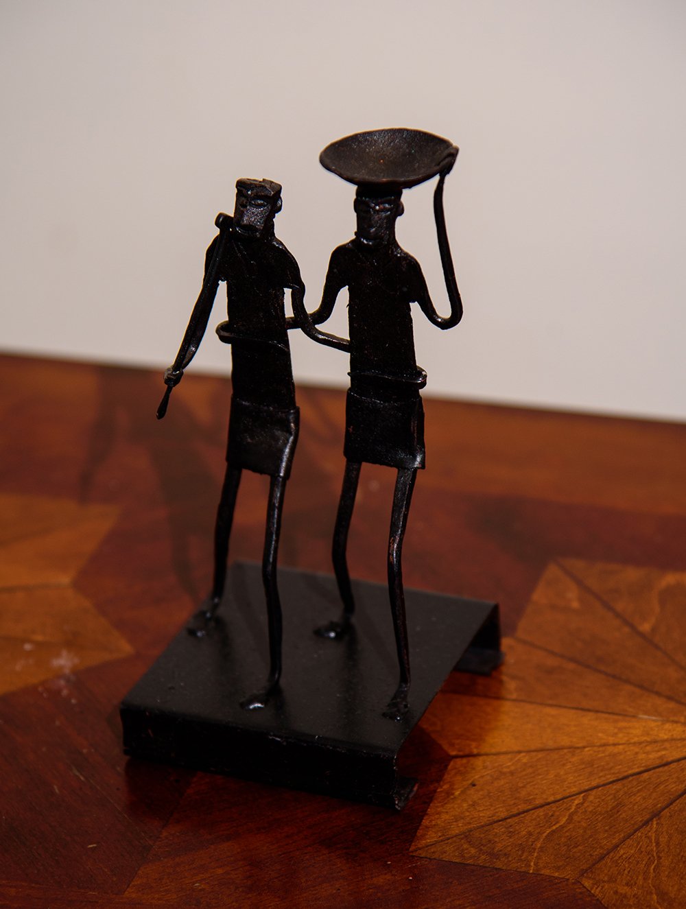 The India Craft House Bastar Tribal Two Men Candle Holder